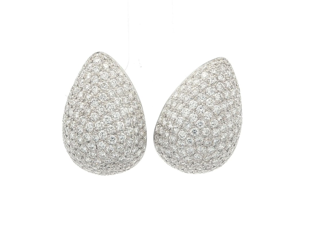 4ctw Pave Diamond Teardrop Earrings in 18k White Gold Omega Back: 4ctw Pave Diamond Teardrop Earrings in 18k White Gold Omega Back These earrings feature a domed teardrop design crafted from solid 18k white gold and are set with numerous round brilliant cut natural 