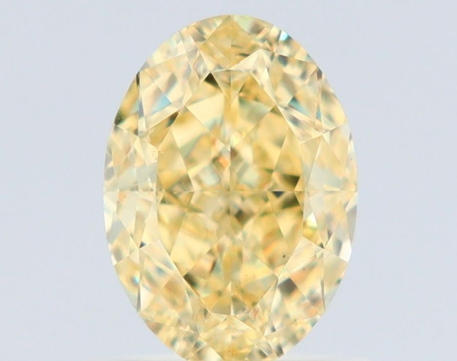 Loose Diamond - OVAL 1.01ct Fancy Yellow VS2: Loose Diamond - OVAL 1.01ct Fancy Yellow VS2 Source: Natural Shape: OVAL Carats: 1.01 Color: Fancy Yellow Certification: GIA Video: