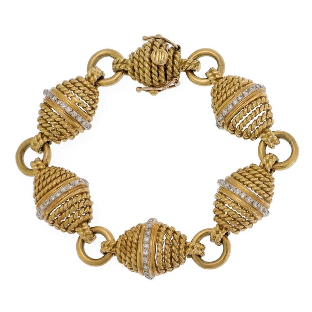 Cassis Collection 18k Yellow Gold Diamond Bracelet 55 Points: Cassis Collection 18k Yellow Gold Diamond Bracelet 55 Points This exquisite designer bracelet from the Cassis Collection is crafted from 18k yellow gold and showcases a stunning series of rhombus-shap