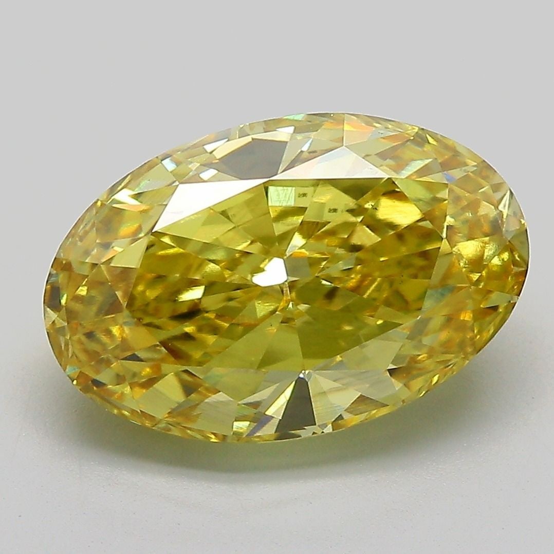 Loose Diamond - OVAL 5.01ct Fancy Vivid Yellow VS1: Loose Diamond - OVAL 5.01ct Fancy Vivid Yellow VS1 Source: This is a real non-mined Diamond that has been grown in a lab Shape: OVAL Carats: 5.01 Color: Fancy Vivid Yellow Certification: IGI Video: