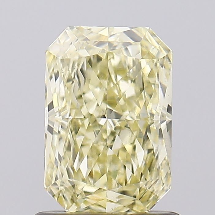 Loose Diamond - RADIANT 1.09ct Fancy Light Yellow VS1: Loose Diamond - RADIANT 1.09ct Fancy Light Yellow VS1 Source: This is a real non-mined Diamond that has been grown in a lab Shape: RADIANT Carats: 1.09 Color: Fancy Light Yellow Certification: IGI Vid