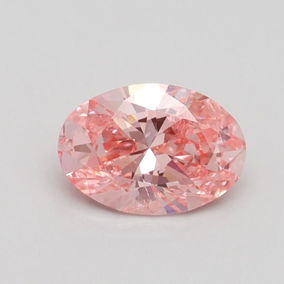 Loose Diamond - OVAL 1.01ct Fancy Vivid Pink SI2: Loose Diamond - OVAL 1.01ct Fancy Vivid Pink SI2 Source: This is a real non-mined Diamond that has been grown in a lab Shape: OVAL Carats: 1.01 Color: Fancy Vivid Pink Certification: IGI Video: