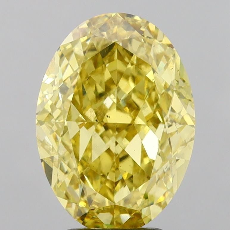 Loose Diamond - OVAL 5.2ct Fancy Vivid Yellow VS2: Loose Diamond - OVAL 5.2ct Fancy Vivid Yellow VS2 Source: This is a real non-mined Diamond that has been grown in a lab Shape: OVAL Carats: 5.2 Color: Fancy Vivid Yellow Certification: IGI Video: