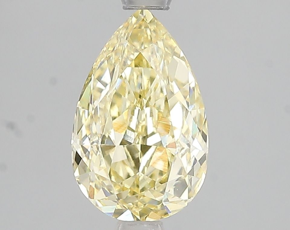 Loose Diamond - PEAR 2.03ct Fancy Intense Yellow VVS2: Loose Diamond - PEAR 2.03ct Fancy Intense Yellow VVS2 Source: This is a real non-mined Diamond that has been grown in a lab Shape: PEAR Carats: 2.03 Color: Fancy Intense Yellow Certification: IGI Vide