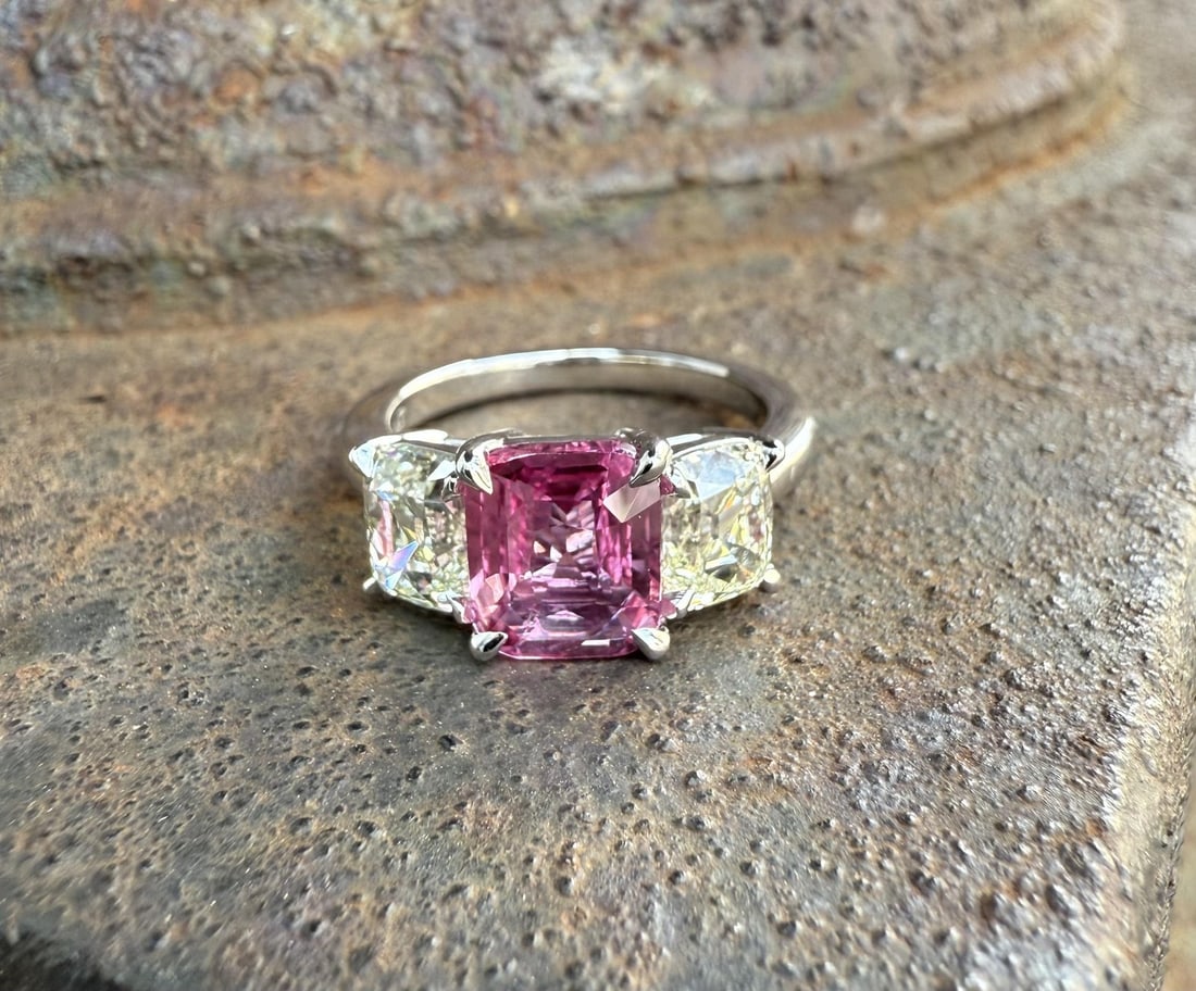 GIA Certified Platinum Ring With No Heat Pink Sapphire and Old Mine Cut Diamonds: GIA Certified Platinum Ring With No Heat Pink Sapphire and Old Mine Cut Diamonds This platinum cocktail ring features a vivid pink, no-heat natural cushion-cut sapphire from Madagascar weighing 2.53 c