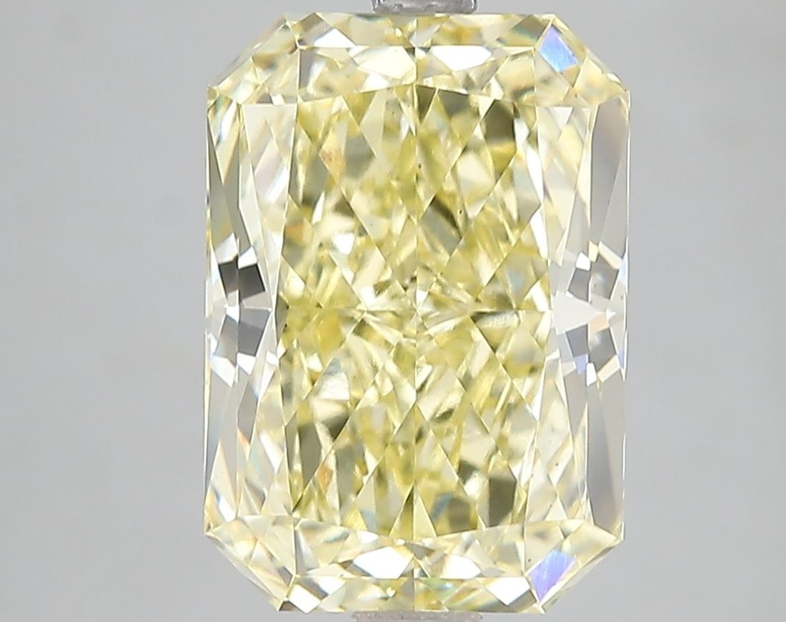 Loose Diamond - RADIANT 5.12ct Fancy Vivid Yellow VS1: Loose Diamond - RADIANT 5.12ct Fancy Vivid Yellow VS1 Source: This is a real non-mined Diamond that has been grown in a lab Shape: RADIANT Carats: 5.12 Color: Fancy Vivid Yellow Certification: IGI Vid