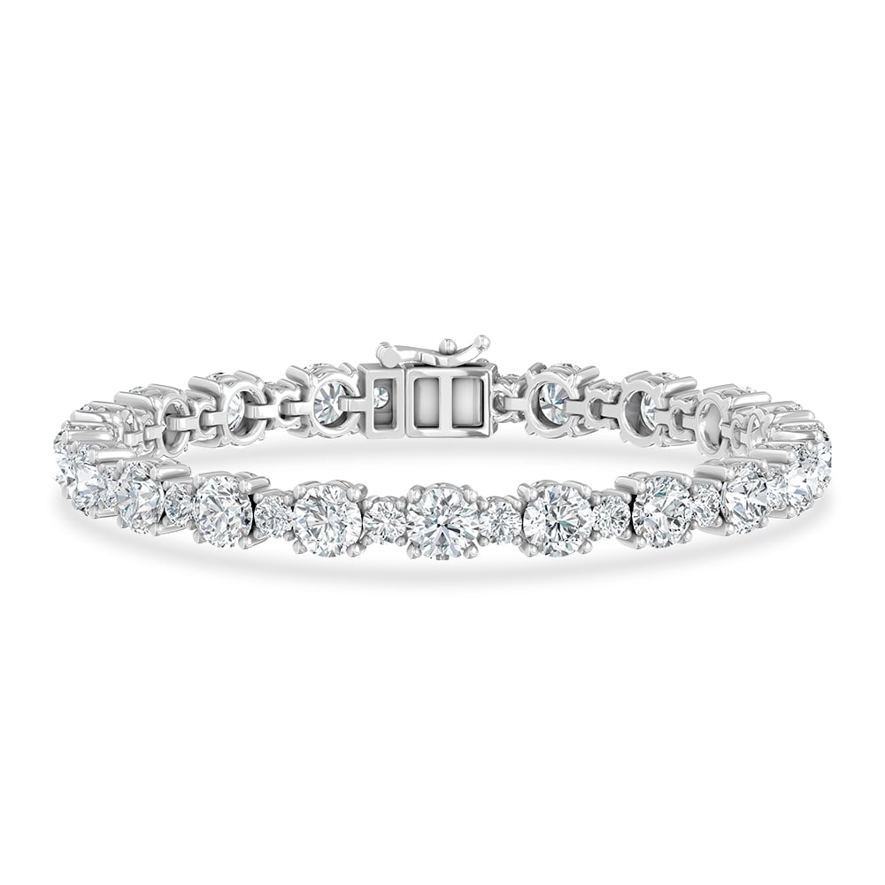 14K White Gold Lab Grown Diamond 12 1/4 Ct.Tw. Fancy Bracelet: 14K White Gold Lab Grown Diamond 12 1/4 Ct.Tw. Fancy Bracelet Designed in polished 14K White Gold, this fashion bracelet features lab grown diamonds totaling 12 1/4 Ct.Tw., offering refined elegance a