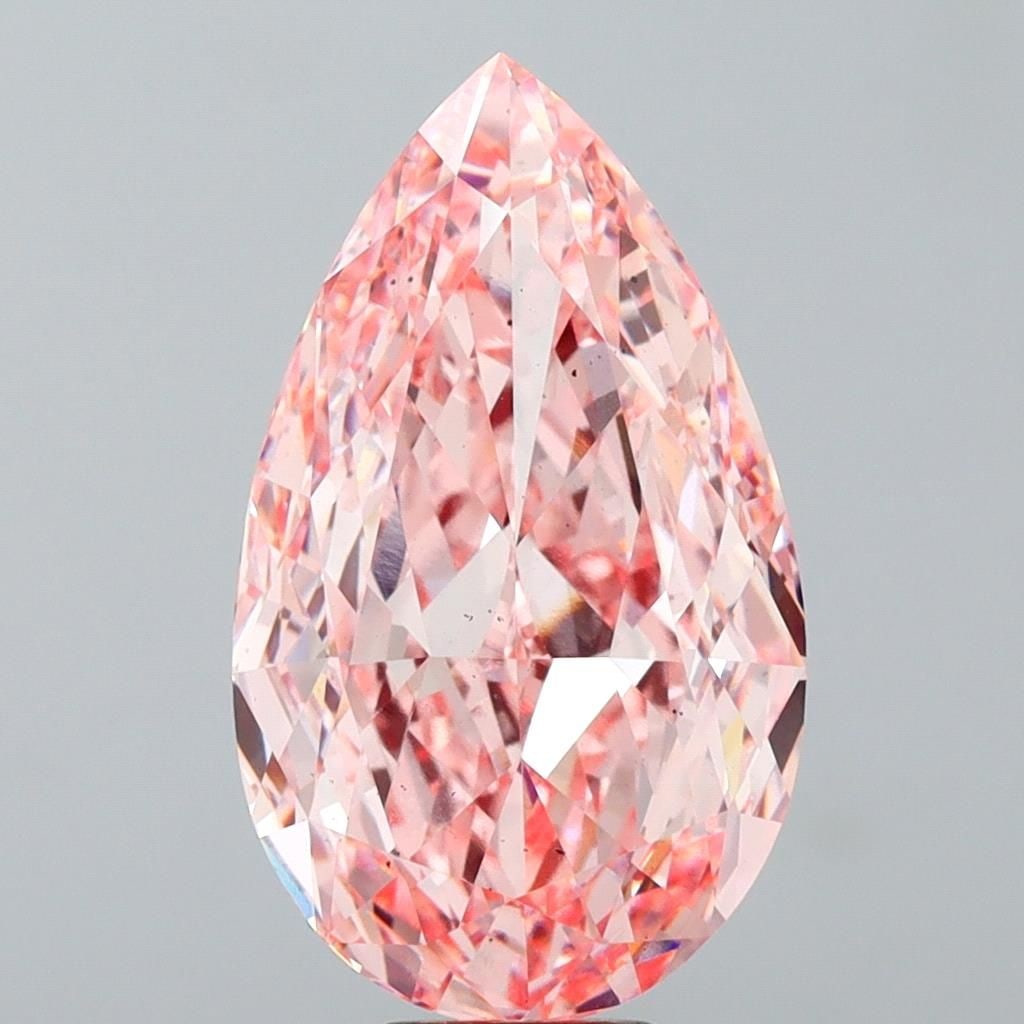 Loose Diamond - PEAR 11.83ct Fancy Vivid Pink VS2: Loose Diamond - PEAR 11.83ct Fancy Vivid Pink VS2 Source: This is a real non-mined Diamond that has been grown in a lab Shape: PEAR Carats: 11.83 Color: Fancy Vivid Pink Certification: IGI Video: