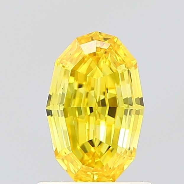 Loose Diamond - OVAL 0.89ct Fancy Vivid Yellow VVS2: Loose Diamond - OVAL 0.89ct Fancy Vivid Yellow VVS2 Source: This is a real non-mined Diamond that has been grown in a lab Shape: OVAL Carats: 0.89 Color: Fancy Vivid Yellow Certification: IGI Video: