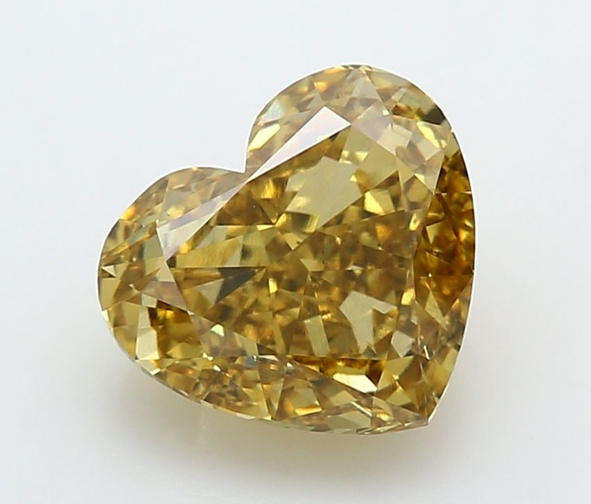 Loose Diamond - HEART 4.07ct Fancy Vivid Yellow VS1: Loose Diamond - HEART 4.07ct Fancy Vivid Yellow VS1 Source: This is a real non-mined Diamond that has been grown in a lab Shape: HEART Carats: 4.07 Color: Fancy Vivid Yellow Certification: IGI Video:
