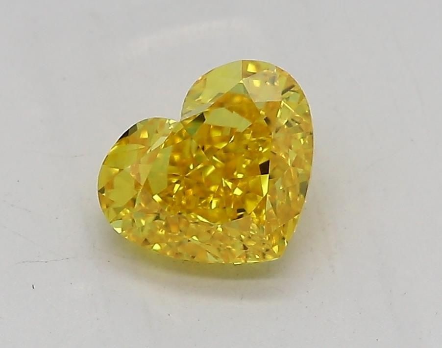 Loose Diamond - HEART 1.02ct Fancy Vivid Yellow VVS2: Loose Diamond - HEART 1.02ct Fancy Vivid Yellow VVS2 Source: This is a real non-mined Diamond that has been grown in a lab Shape: HEART Carats: 1.02 Color: Fancy Vivid Yellow Certification: IGI Video: