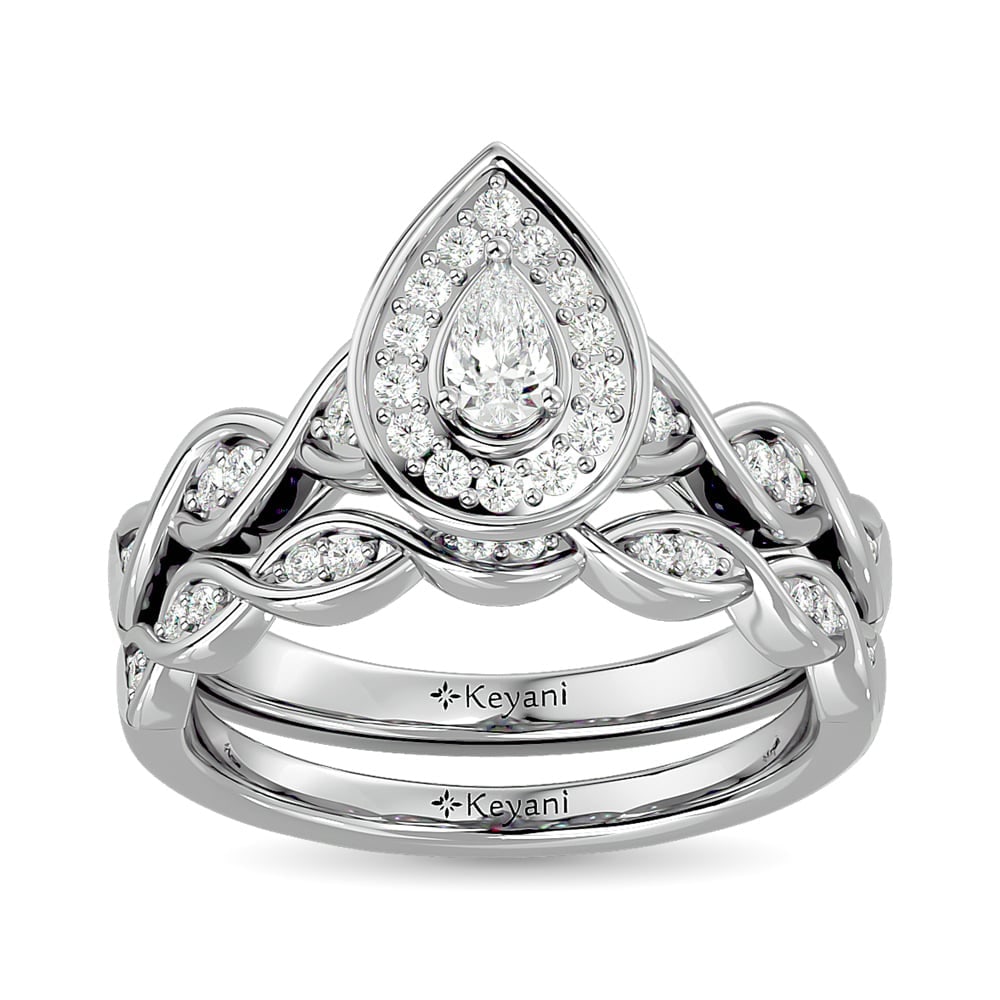 Diamond 1/2 Ct.Tw. Pear Cut Bridal Ring in 14K White Gold: Diamond 1/2 Ct.Tw. Pear Cut Bridal Ring in 14K White Gold 14k White Gold Stone Color: G-h Stone Clarity: Si2 Each ring is presented in standard size 6.5. Complimentary resizing is available between si