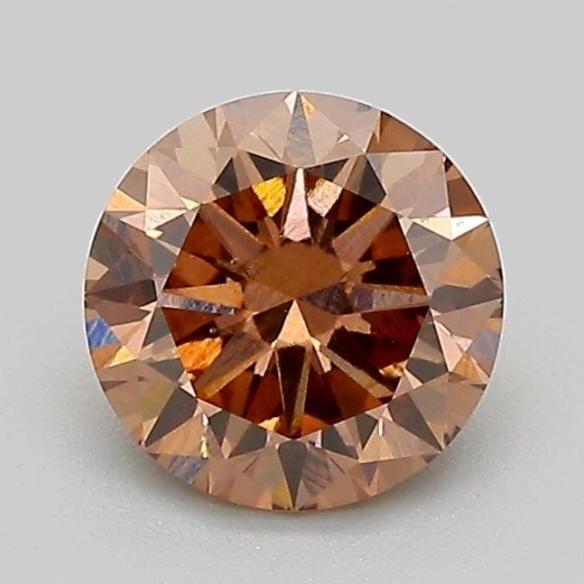 Loose Diamond - ROUND 1.06ct Fancy Brown VS2: Loose Diamond - ROUND 1.06ct Fancy Brown VS2 Source: This is a real non-mined Diamond that has been grown in a lab Shape: ROUND Carats: 1.06 Color: Fancy Brown Certification: IGI Video: