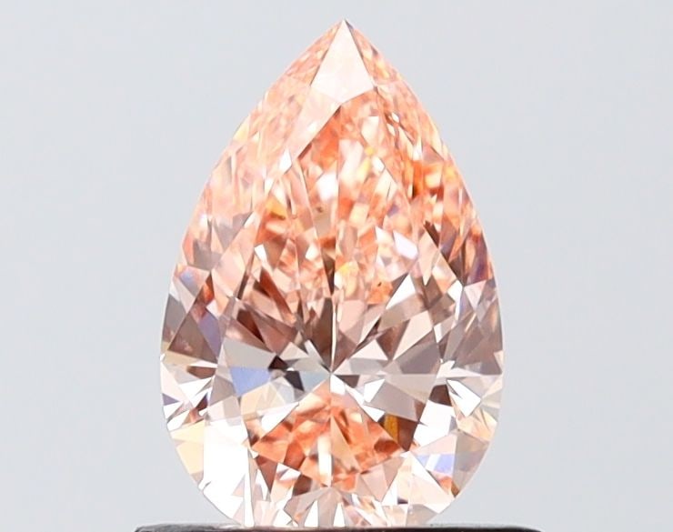 Loose Diamond - PEAR 1.0ct Fancy Vivid Pink VS2: Loose Diamond - PEAR 1.0ct Fancy Vivid Pink VS2 Source: This is a real non-mined Diamond that has been grown in a lab Shape: PEAR Carats: 1.0 Color: Fancy Vivid Pink Certification: IGI Video:
