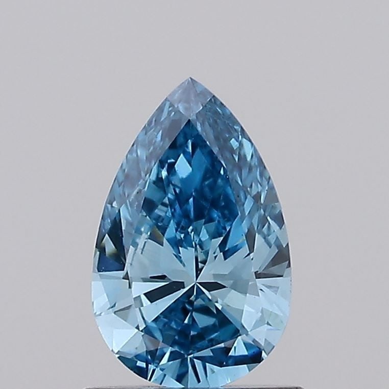 Loose Diamond - PEAR 0.73ct Fancy Vivid Blue VVS2: Loose Diamond - PEAR 0.73ct Fancy Vivid Blue VVS2 Source: This is a real non-mined Diamond that has been grown in a lab Shape: PEAR Carats: 0.73 Color: Fancy Vivid Blue Certification: IGI Video: