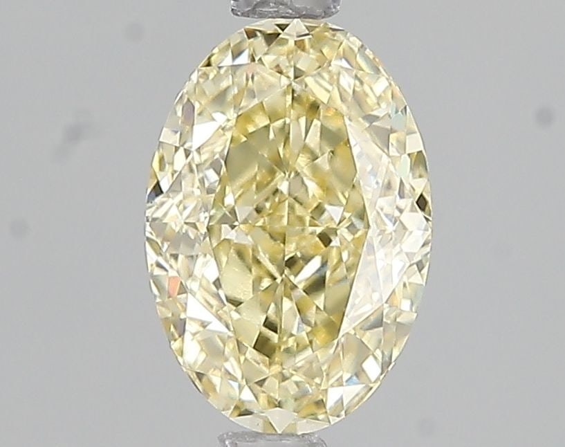 Loose Diamond - OVAL 1.59ct Fancy Intense Yellow VVS2: Loose Diamond - OVAL 1.59ct Fancy Intense Yellow VVS2 Source: This is a real non-mined Diamond that has been grown in a lab Shape: OVAL Carats: 1.59 Color: Fancy Intense Yellow Certification: IGI Vide