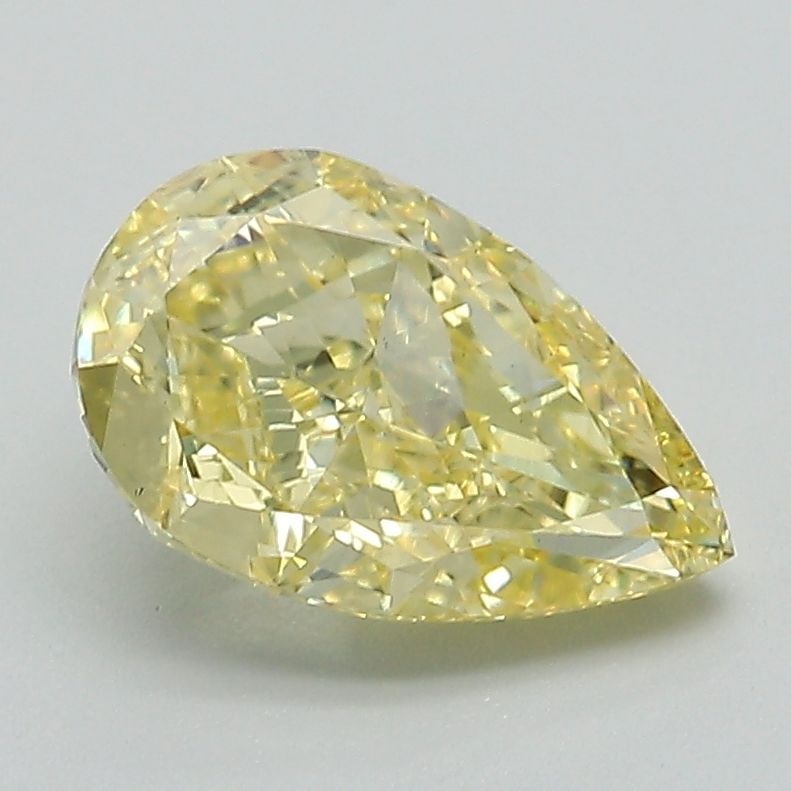 Loose Diamond - PEAR 1.7ct Fancy Vivid Yellow VS2: Loose Diamond - PEAR 1.7ct Fancy Vivid Yellow VS2 Source: This is a real non-mined Diamond that has been grown in a lab Shape: PEAR Carats: 1.7 Color: Fancy Vivid Yellow Certification: IGI Video: