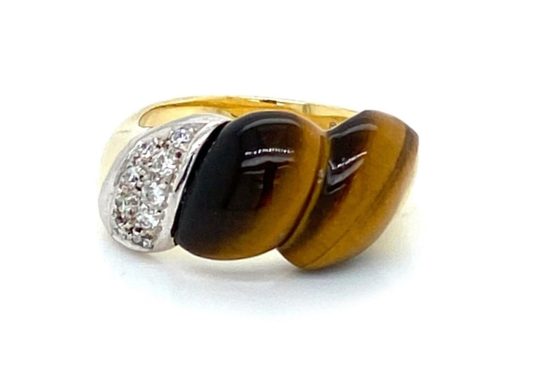 Vintage 14k Two Tone Gold Tigers Eye Diamond Ring Size 6.5: Vintage 14k Two Tone Gold Tigers Eye Diamond Ring Size 6.5 This vintage estate statement ring is crafted in 14k two-tone gold and features a tiger's eye gemstone accented by approximately 0.20 ct tota