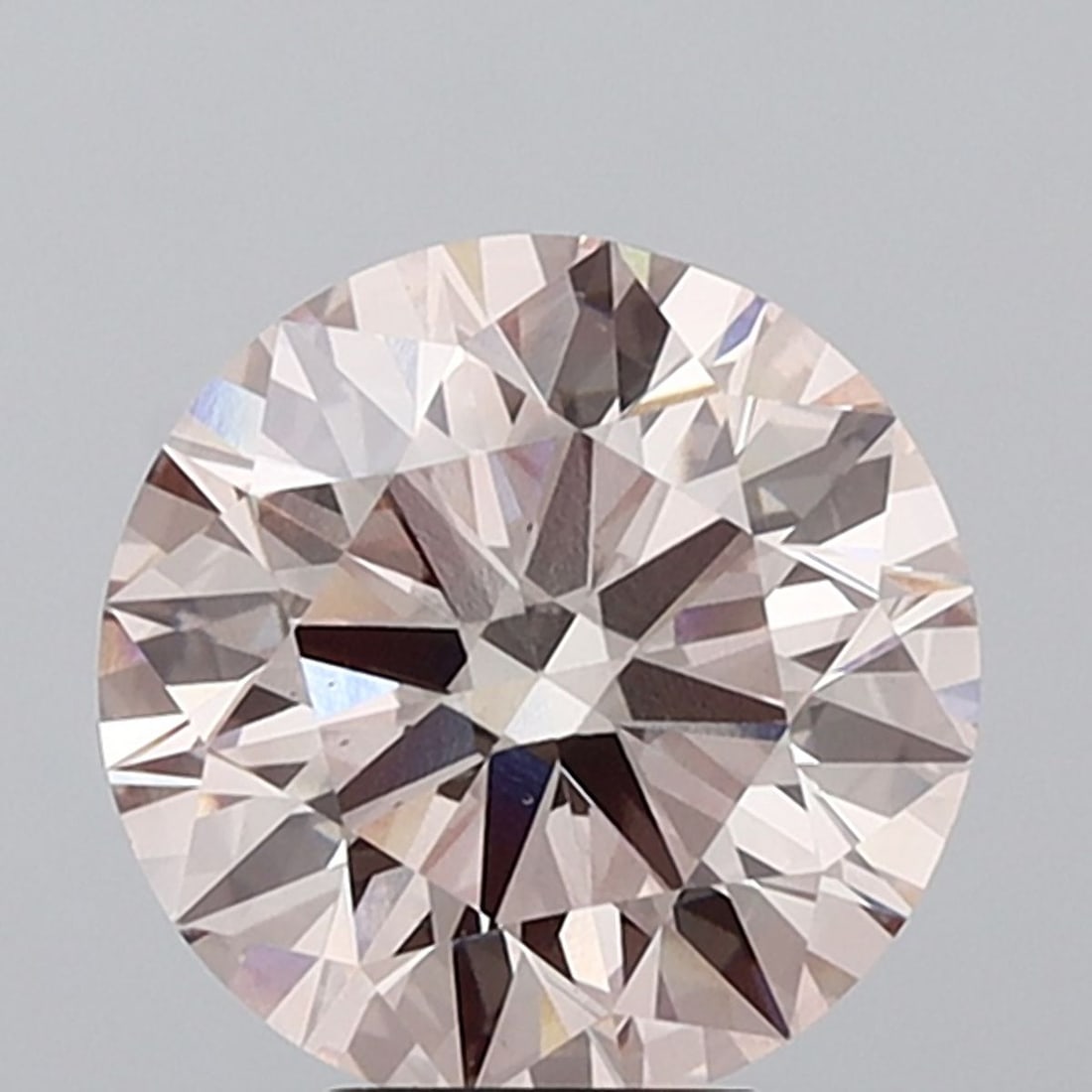 Ideal Loose Diamond - ROUND 6.0ct Fancy Pink VS1: Ideal Loose Diamond - ROUND 6.0ct Fancy Pink VS1 Source: This is a real non-mined Diamond that has been grown in a lab Shape: ROUND Carats: 6.0 Color: Fancy Pink Certification: IGI Video: