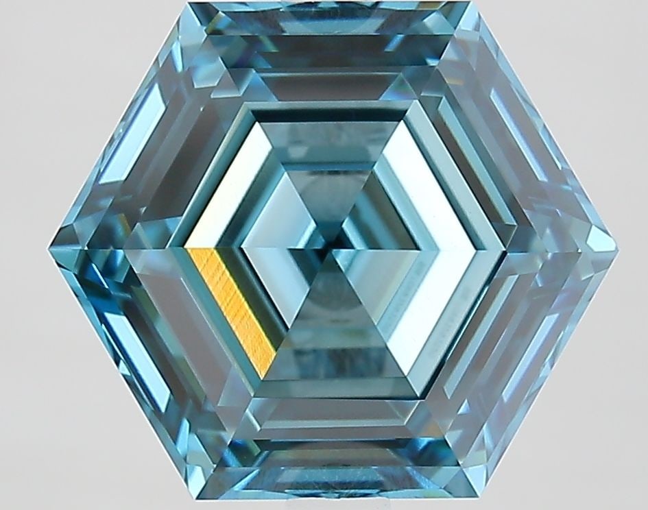 Loose Diamond - HEXAGONAL 5.57ct Fancy Vivid Blue VVS2: Loose Diamond - HEXAGONAL 5.57ct Fancy Vivid Blue VVS2 Source: This is a real non-mined Diamond that has been grown in a lab Shape: HEXAGONAL Carats: 5.57 Color: Fancy Vivid Blue Certification: IGI Vi