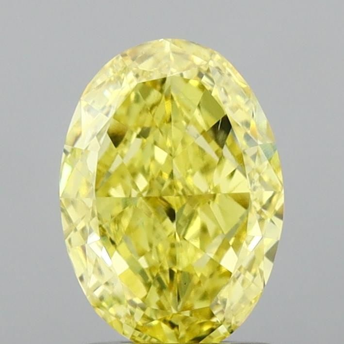 Loose Diamond - OVAL 1.55ct Fancy Vivid Yellow VS1: Loose Diamond - OVAL 1.55ct Fancy Vivid Yellow VS1 Source: This is a real non-mined Diamond that has been grown in a lab Shape: OVAL Carats: 1.55 Color: Fancy Vivid Yellow Certification: IGI Video: