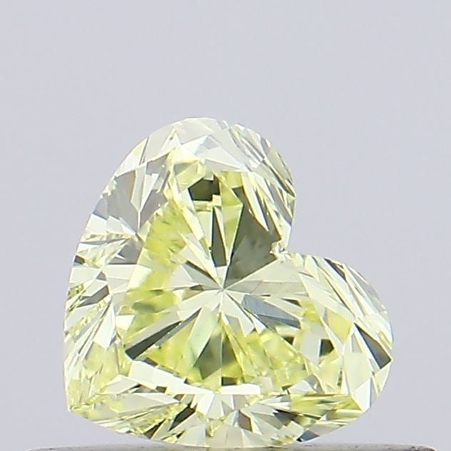Loose Diamond - HEART 0.46ct Fancy Light Yellow VS1: Loose Diamond - HEART 0.46ct Fancy Light Yellow VS1 Source: This is a real non-mined Diamond that has been grown in a lab Shape: HEART Carats: 0.46 Color: Fancy Light Yellow Certification: IGI Video: