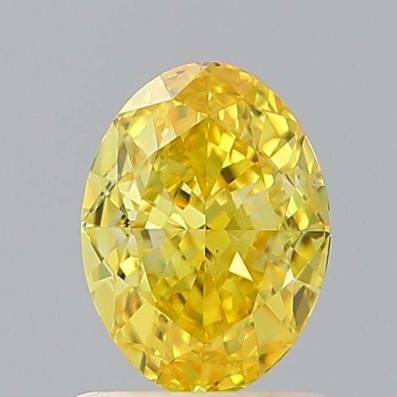 Loose Diamond - OVAL 1.04ct Fancy Vivid Yellow VS1: Loose Diamond - OVAL 1.04ct Fancy Vivid Yellow VS1 Source: This is a real non-mined Diamond that has been grown in a lab Shape: OVAL Carats: 1.04 Color: Fancy Vivid Yellow Certification: IGI Video: