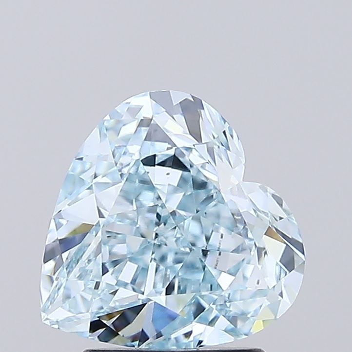 Loose Diamond - HEART 3.0ct Fancy Blue VS1: Loose Diamond - HEART 3.0ct Fancy Blue VS1 Source: This is a real non-mined Diamond that has been grown in a lab Shape: HEART Carats: 3.0 Color: Fancy Blue Certification: IGI Video: