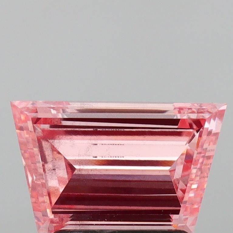 Loose Diamond - TRAPEZOID 1.58ct Fancy Vivid Pink VS2: Loose Diamond - TRAPEZOID 1.58ct Fancy Vivid Pink VS2 Source: This is a real non-mined Diamond that has been grown in a lab Shape: TRAPEZOID Carats: 1.58 Color: Fancy Vivid Pink Certification: IGI Vid