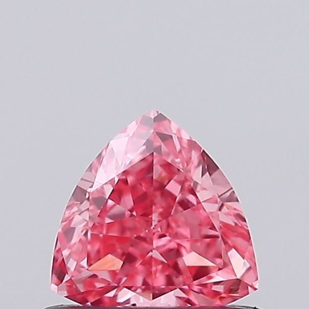 Loose Diamond - TRIANGULAR 0.52ct Fancy Vivid Pink VS1: Loose Diamond - TRIANGULAR 0.52ct Fancy Vivid Pink VS1 Source: This is a real non-mined Diamond that has been grown in a lab Shape: TRIANGULAR Carats: 0.52 Color: Fancy Vivid Pink Certification: IGI V