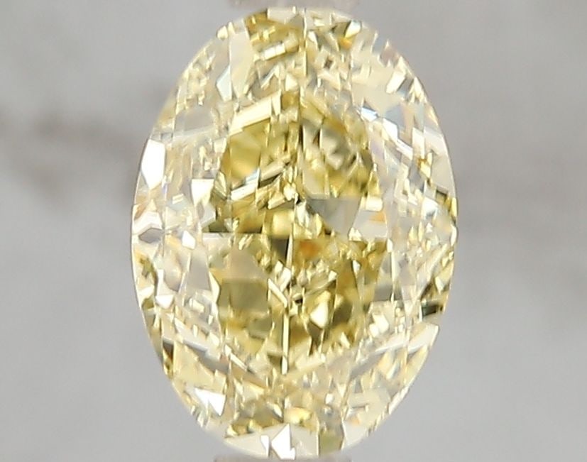 Loose Diamond - OVAL 2.0ct Fancy Vivid Yellow VS1: Loose Diamond - OVAL 2.0ct Fancy Vivid Yellow VS1 Source: This is a real non-mined Diamond that has been grown in a lab Shape: OVAL Carats: 2.0 Color: Fancy Vivid Yellow Certification: IGI Video: