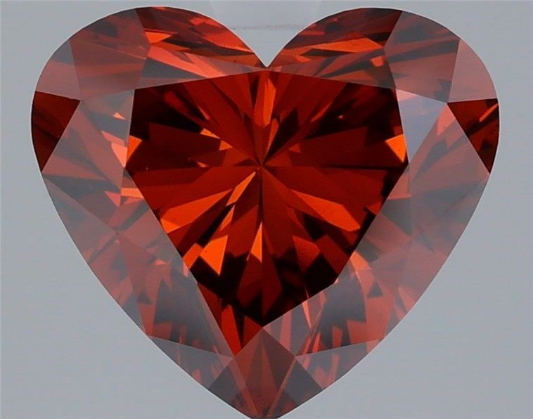 Loose Diamond - HEART 3.03ct Fancy Deep Orange VS1: Loose Diamond - HEART 3.03ct Fancy Deep Orange VS1 Source: This is a real non-mined Diamond that has been grown in a lab Shape: HEART Carats: 3.03 Color: Fancy Deep Orange Certification: IGI Video:
