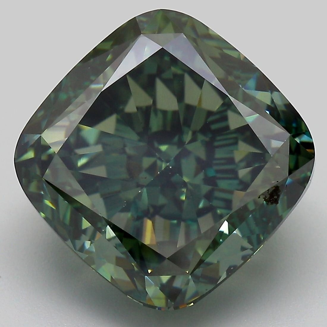 Loose Diamond - CUSHION MODIFIED 12.27ct Fancy Deep Green VS1: Loose Diamond - CUSHION MODIFIED 12.27ct Fancy Deep Green VS1 Source: This is a real non-mined Diamond that has been grown in a lab Shape: CUSHION MODIFIED Carats: 12.27 Color: Fancy Deep Green Certif