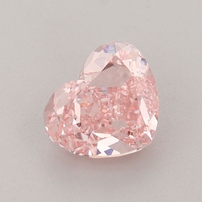Loose Diamond - HEART 0.88ct Fancy Vivid Pink VS1: Loose Diamond - HEART 0.88ct Fancy Vivid Pink VS1 Source: This is a real non-mined Diamond that has been grown in a lab Shape: HEART Carats: 0.88 Color: Fancy Vivid Pink Certification: IGI Video: