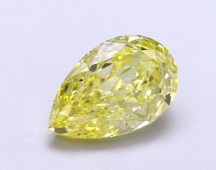 Loose Diamond - PEAR 2.32ct Fancy Vivid Yellow VS1: Loose Diamond - PEAR 2.32ct Fancy Vivid Yellow VS1 Source: This is a real non-mined Diamond that has been grown in a lab Shape: PEAR Carats: 2.32 Color: Fancy Vivid Yellow Certification: IGI Video: