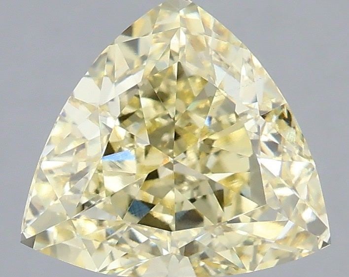 Loose Diamond - TRIANGULAR 2.58ct Fancy Yellow VS1: Loose Diamond - TRIANGULAR 2.58ct Fancy Yellow VS1 Source: This is a real non-mined Diamond that has been grown in a lab Shape: TRIANGULAR Carats: 2.58 Color: Fancy Yellow Certification: IGI Video: