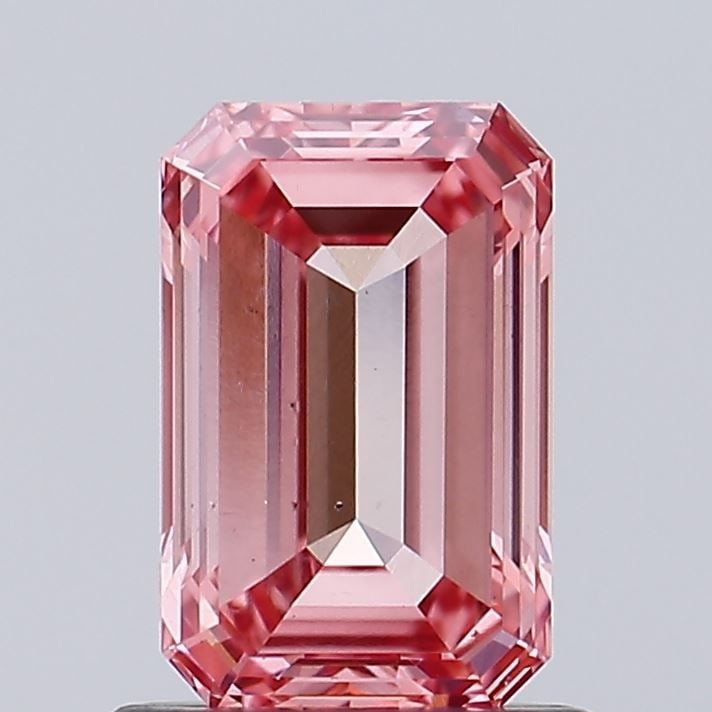 Loose Diamond - EMERALD 1.04ct Fancy Vivid Pink VS2: Loose Diamond - EMERALD 1.04ct Fancy Vivid Pink VS2 Source: This is a real non-mined Diamond that has been grown in a lab Shape: EMERALD Carats: 1.04 Color: Fancy Vivid Pink Certification: IGI Video:
