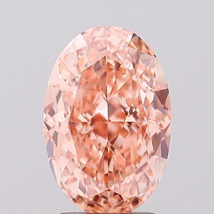 Loose Diamond - OVAL 2.81ct Fancy Vivid Pinkish Orange VVS2: Loose Diamond - OVAL 2.81ct Fancy Vivid Pinkish Orange VVS2 Source: This is a real non-mined Diamond that has been grown in a lab Shape: OVAL Carats: 2.81 Color: Fancy Vivid Pinkish Orange Certificati