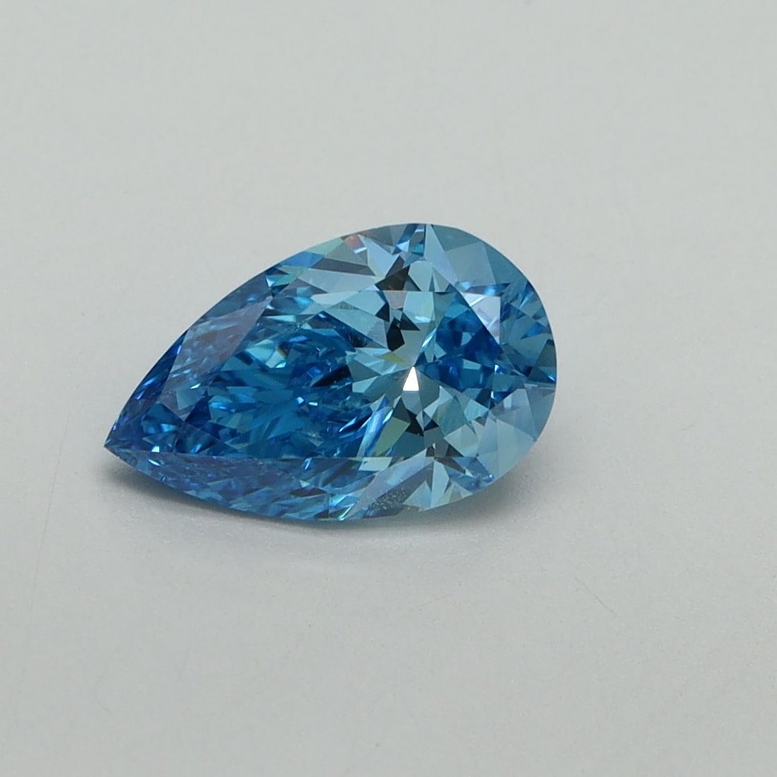 Loose Diamond - PEAR 1.02ct Fancy Vivid Blue VVS2: Loose Diamond - PEAR 1.02ct Fancy Vivid Blue VVS2 Source: This is a real non-mined Diamond that has been grown in a lab Shape: PEAR Carats: 1.02 Color: Fancy Vivid Blue Certification: IGI Video: