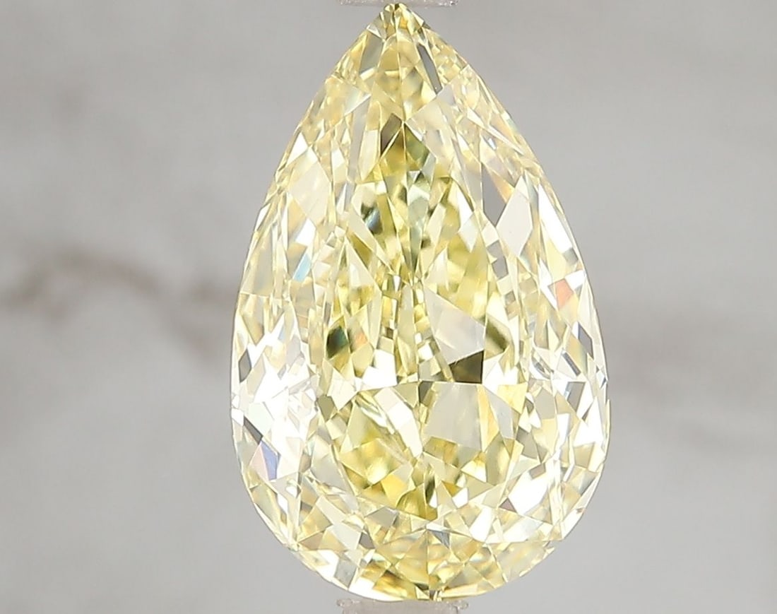 Loose Diamond - PEAR 3.56ct Fancy Vivid Yellow VS1: Loose Diamond - PEAR 3.56ct Fancy Vivid Yellow VS1 Source: This is a real non-mined Diamond that has been grown in a lab Shape: PEAR Carats: 3.56 Color: Fancy Vivid Yellow Certification: IGI Video: