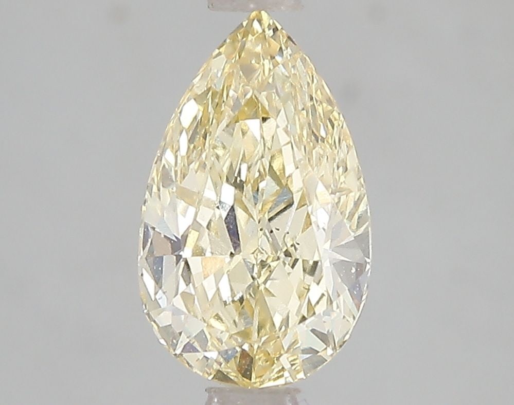 Loose Diamond - PEAR 2.01ct Fancy Intense Yellow VS2: Loose Diamond - PEAR 2.01ct Fancy Intense Yellow VS2 Source: This is a real non-mined Diamond that has been grown in a lab Shape: PEAR Carats: 2.01 Color: Fancy Intense Yellow Certification: IGI Video