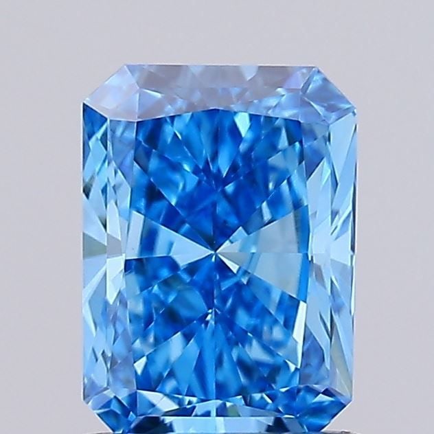 Loose Diamond - RADIANT 0.97ct Fancy Vivid Blue VVS2: Loose Diamond - RADIANT 0.97ct Fancy Vivid Blue VVS2 Source: This is a real non-mined Diamond that has been grown in a lab Shape: RADIANT Carats: 0.97 Color: Fancy Vivid Blue Certification: IGI Video: