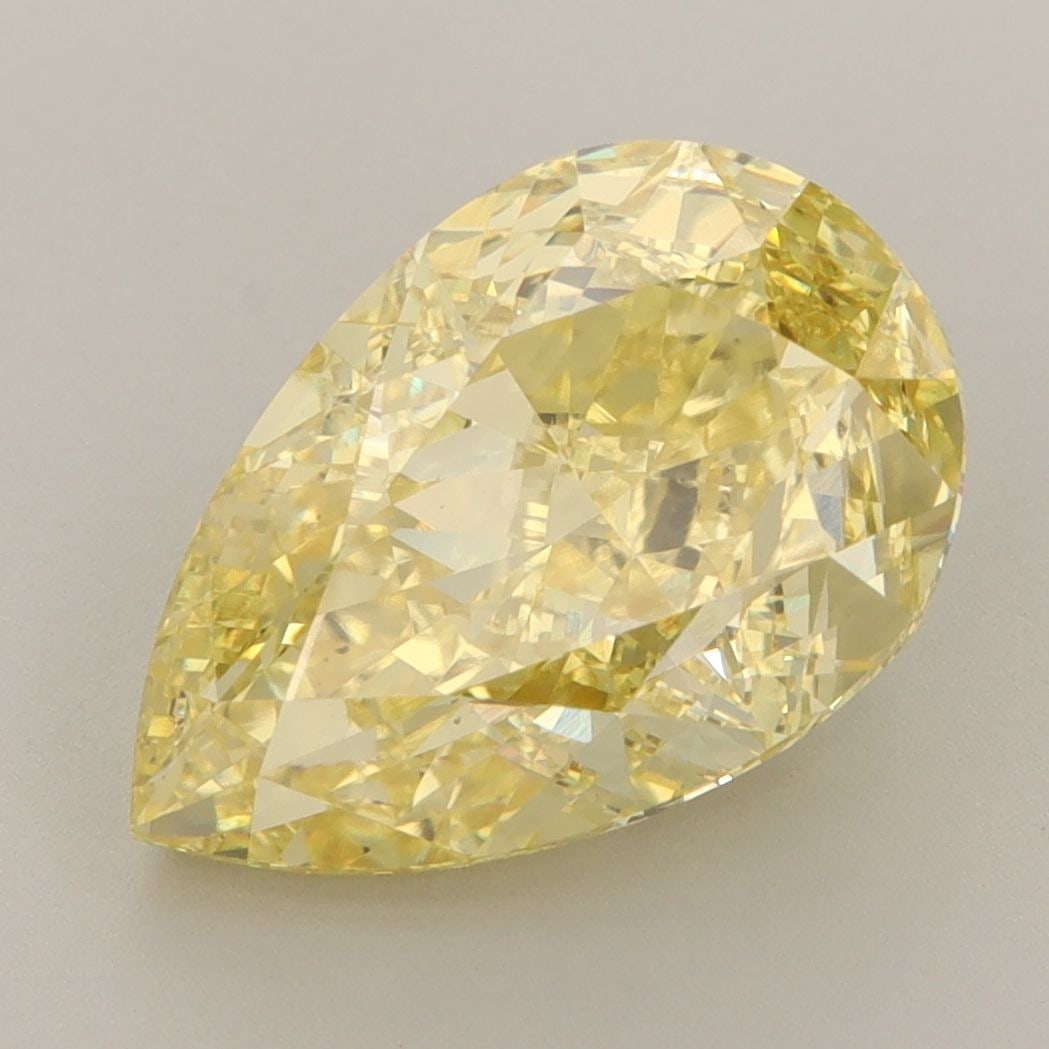Loose Diamond - PEAR 5.08ct Fancy Vivid Yellow VS2: Loose Diamond - PEAR 5.08ct Fancy Vivid Yellow VS2 Source: This is a real non-mined Diamond that has been grown in a lab Shape: PEAR Carats: 5.08 Color: Fancy Vivid Yellow Certification: IGI Video: