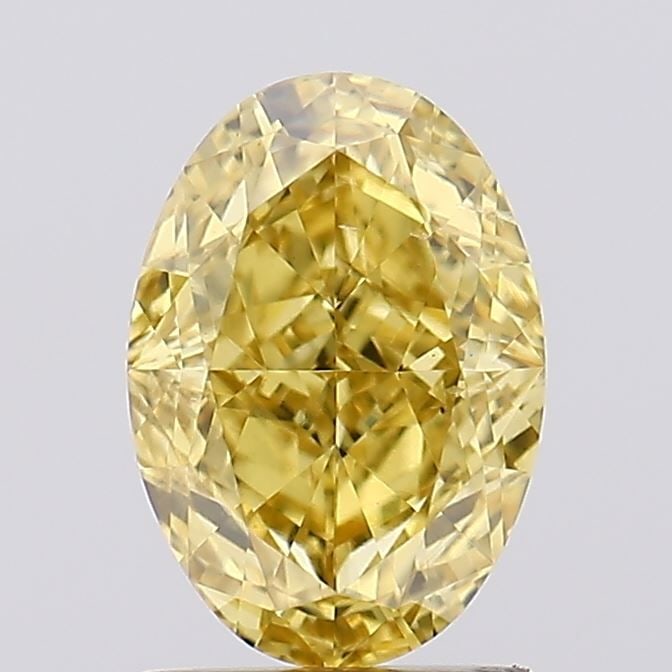 Loose Diamond - OVAL 1.61ct Fancy Vivid Yellow VS2: Loose Diamond - OVAL 1.61ct Fancy Vivid Yellow VS2 Source: This is a real non-mined Diamond that has been grown in a lab Shape: OVAL Carats: 1.61 Color: Fancy Vivid Yellow Certification: IGI Video: