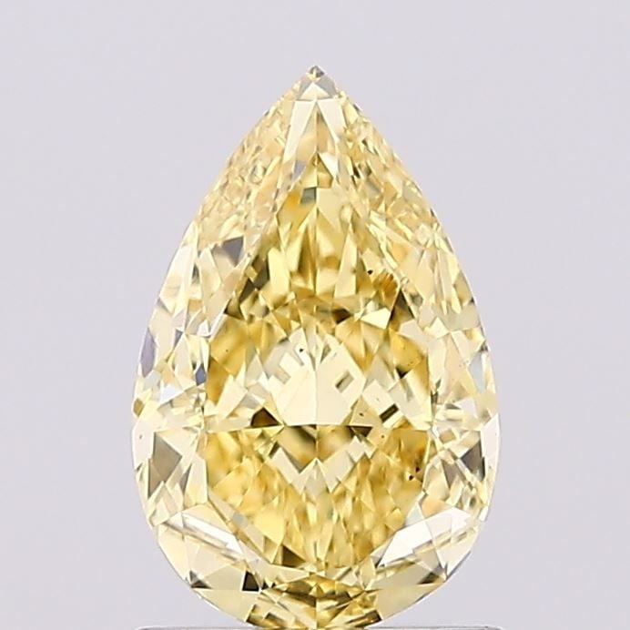Loose Diamond - PEAR 1.06ct Fancy Vivid Yellow VS2: Loose Diamond - PEAR 1.06ct Fancy Vivid Yellow VS2 Source: This is a real non-mined Diamond that has been grown in a lab Shape: PEAR Carats: 1.06 Color: Fancy Vivid Yellow Certification: IGI Video: