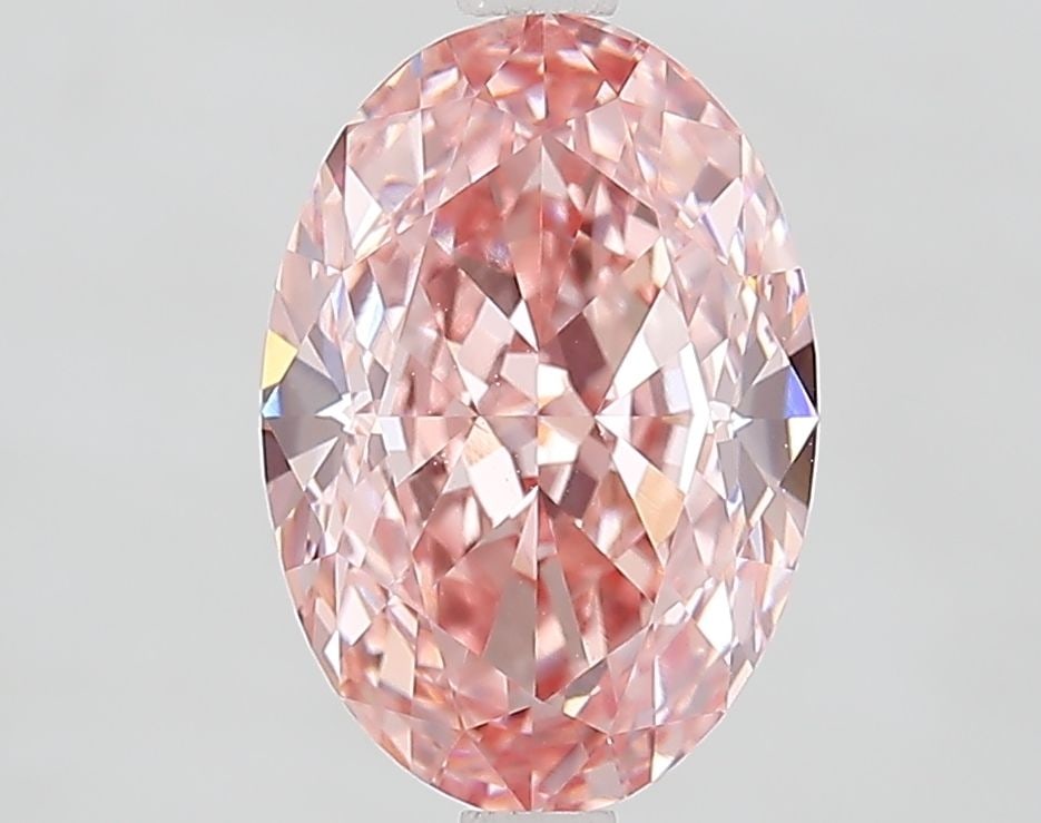 Loose Diamond - OVAL 3.1ct Fancy Vivid Pink VVS2: Loose Diamond - OVAL 3.1ct Fancy Vivid Pink VVS2 Source: This is a real non-mined Diamond that has been grown in a lab Shape: OVAL Carats: 3.1 Color: Fancy Vivid Pink Certification: IGI Video:
