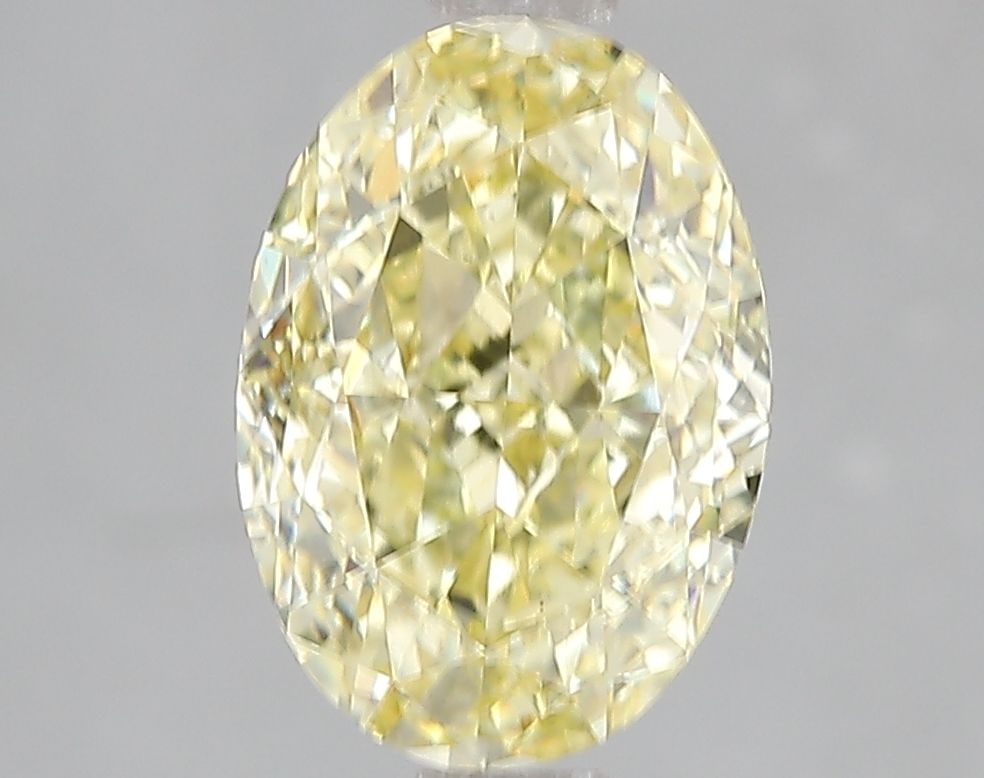 Loose Diamond - OVAL 3.01ct Fancy Intense Yellow VS2: Loose Diamond - OVAL 3.01ct Fancy Intense Yellow VS2 Source: This is a real non-mined Diamond that has been grown in a lab Shape: OVAL Carats: 3.01 Color: Fancy Intense Yellow Certification: IGI Video