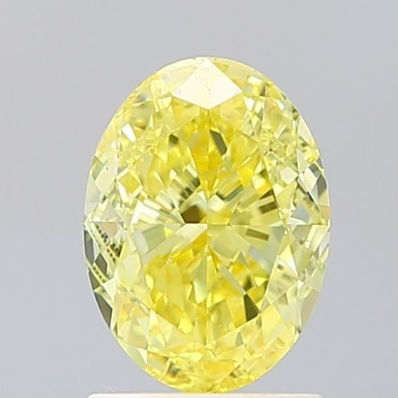 Loose Diamond - OVAL 1.8ct Fancy Vivid Yellow VVS2: Loose Diamond - OVAL 1.8ct Fancy Vivid Yellow VVS2 Source: This is a real non-mined Diamond that has been grown in a lab Shape: OVAL Carats: 1.8 Color: Fancy Vivid Yellow Certification: IGI Video: