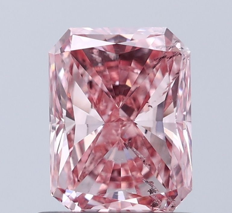 Loose Diamond - RADIANT 1.0ct Fancy Vivid Pink I1: Loose Diamond - RADIANT 1.0ct Fancy Vivid Pink I1 Source: This is a real non-mined Diamond that has been grown in a lab Shape: RADIANT Carats: 1.0 Color: Fancy Vivid Pink Certification: IGI Video: