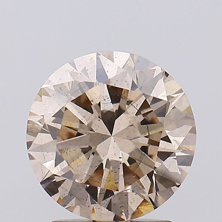 Loose Diamond - ROUND 2.05ct Light Brown SI1: Loose Diamond - ROUND 2.05ct Light Brown SI1 Source: This is a real non-mined Diamond that has been grown in a lab Shape: ROUND Carats: 2.05 Color: Light Brown Certification: IGI Video: